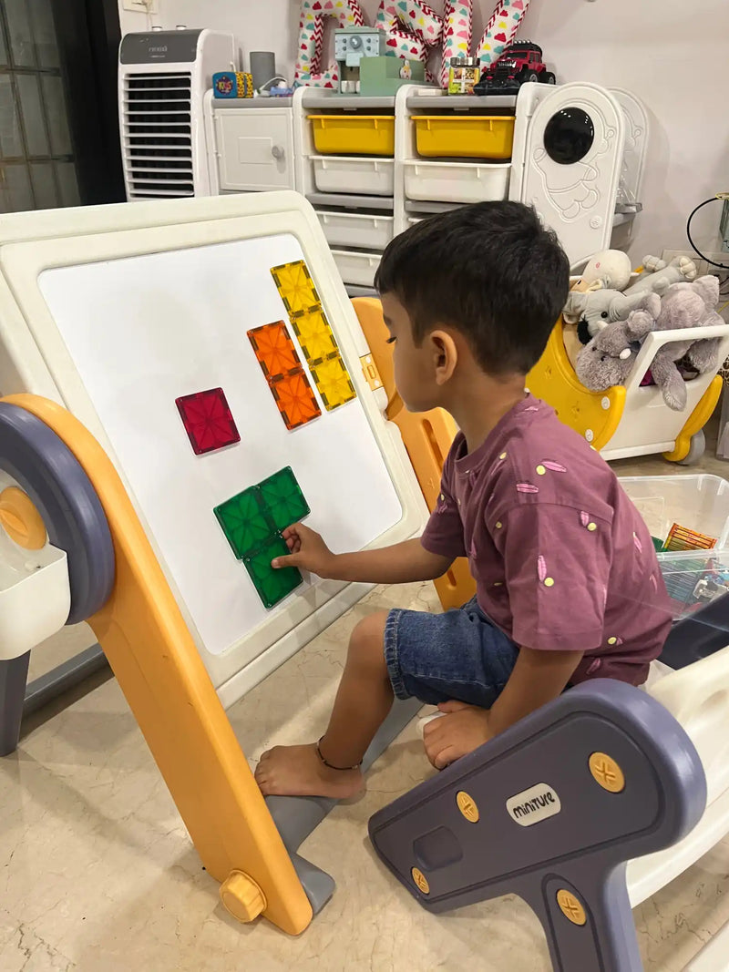 A child’s magnetic drawing board and easel set.
