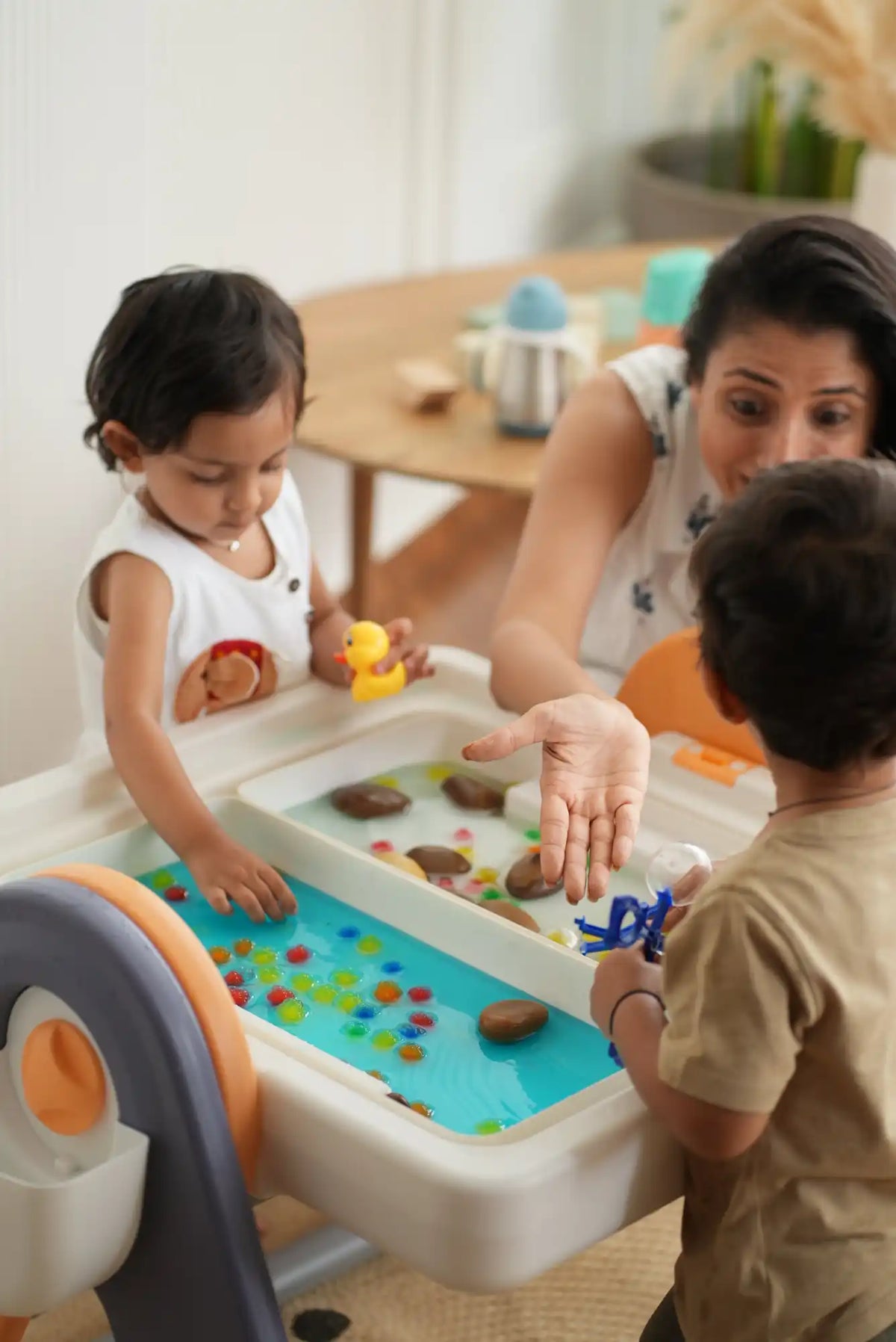 A sensory table designed for children’s water and tactile play activities.
